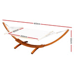 White hammock with wooden stand