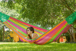 outdoor cotton hammock in pink and yellow